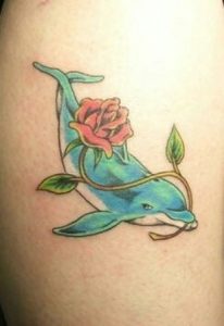Swimming Dolphin And Rose Tattoo
