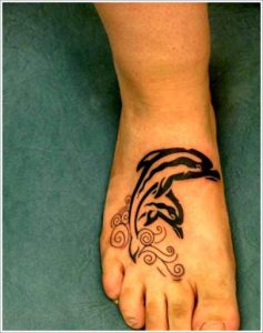Dolphin On Foot Tattoo
