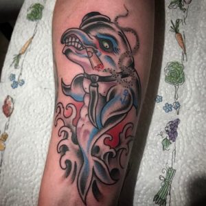 The Tough Guy: Dolphin Tattoos